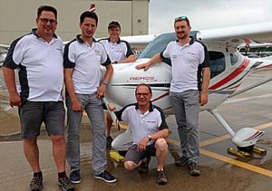 Meet Team Remos from Germany at EAA AirVenture Oshkosh 2016: (L-R) Christian, Daniel, Patrick, Jürgen (kneeling), and Paul.