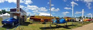 In this panorama shot, you see the entire Aerotrek display. To the left is a handsome trailer that can house an Aerotrek under which the owner drives his late-model Corvette. Nice!