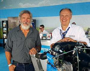 Actor Harrison Ford poses with Rotax Aircraft Engine manager, Christian Mundigler at Oshkosh. photo courtesy Christian Mundigler