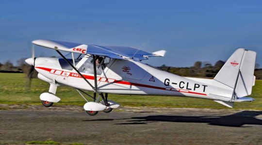 Light aircraft Comco Ikarus C42 Cyclone stands by at the airport, Hoexter  Holzminden airfield, Raeuschenberg, Hoexter, Weserbergland, North Stock  Photo - Alamy
